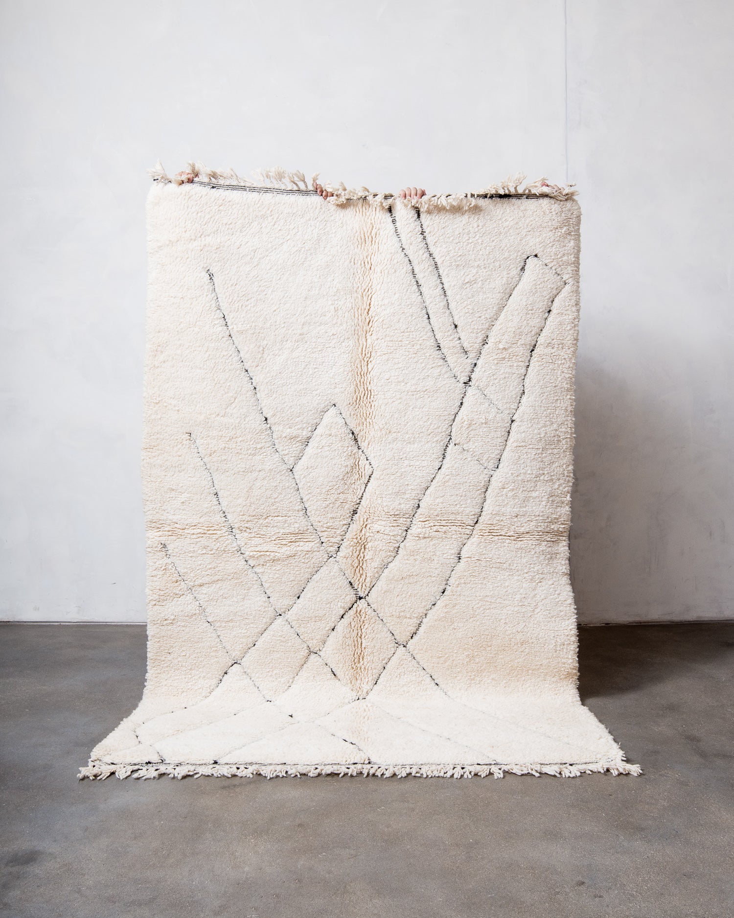 Modern, designer, handcrafted Berber rug from Morocco. Beniourain carpet with beautiful colours and patterns and fluffy wool texture.